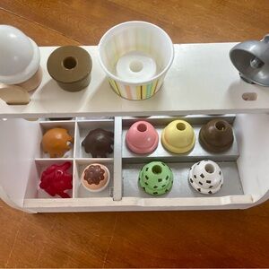 Melissa & Doug Scoop & Serve Ice Cream Counter with Striped Design